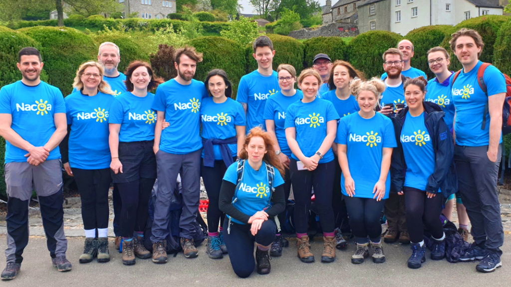 Walkers in blue Nacoa t-shirts at start of Big Nacoa Walk 2019 raising money for children of alcoholics